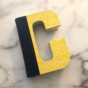Anthropologie Letter C cut book. Perfect, bright accent piece for book case!